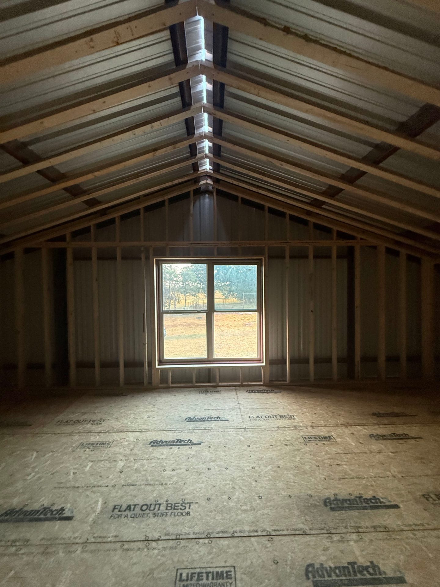 Vaulted gable framing inside a barndominium built by Elite Solutions of Texas in Northeast Texas